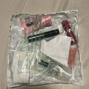 Clinique smart night sample with sample size gifts and Clinique purple bag ￼
